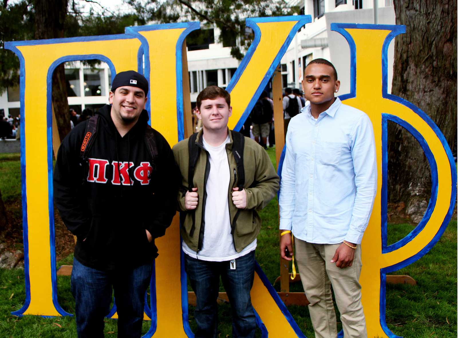 Members of Pi Kappa Phi pose next to Cesar Chavez Plaza on Thursday, August 28, 2013. The fraternity is recruiting new members as part of rush week. Photo by Gavin McIntyre / Xpress 
