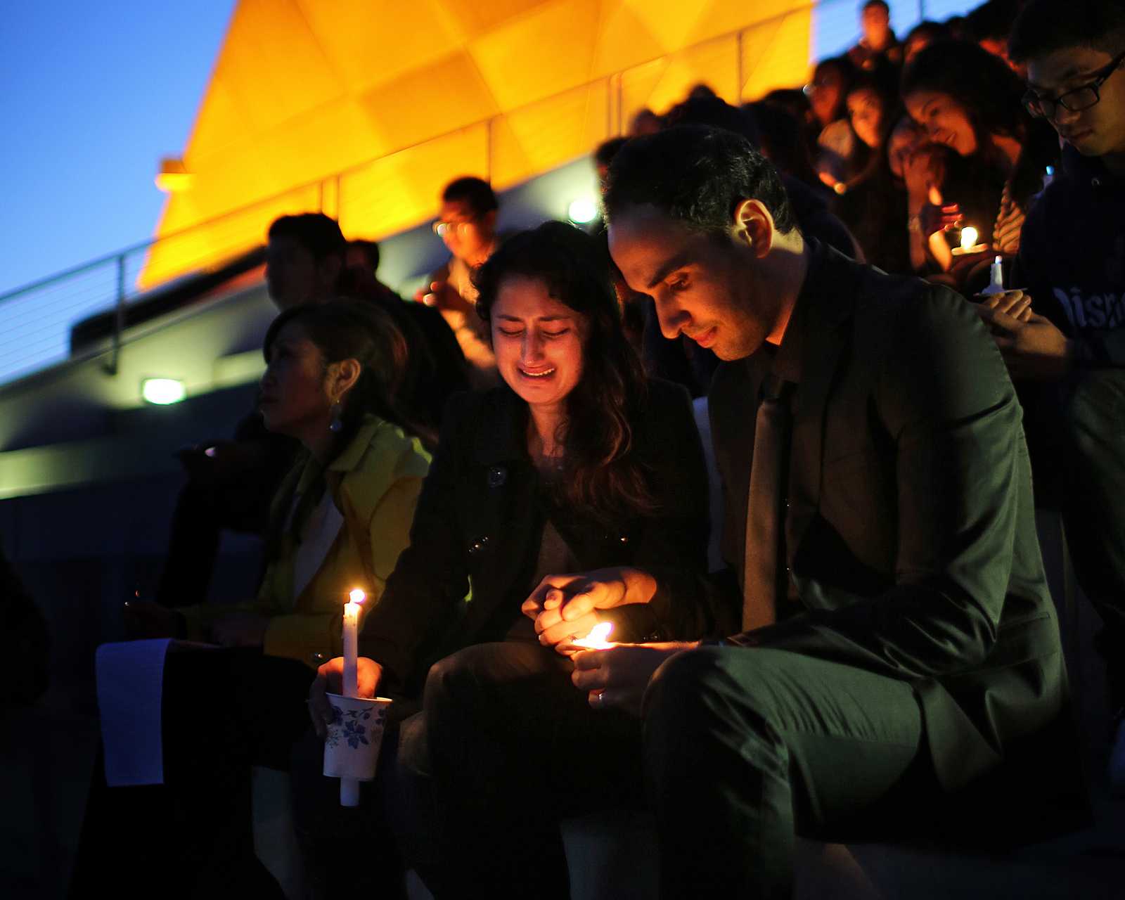Jessica and Nizar Labidi, sister and brother-in-law of Justin Valdez, attend the candlelight vigil on top of the Cesar Chavez Student Center at SF State for Valdez on Thursday, Sept. 26. Valdez was a SF State student who was shot and killed on Sept. 23 as he got off of the M-Oceanview train in Ingleside. Photo by John Ornelas / Xpress
