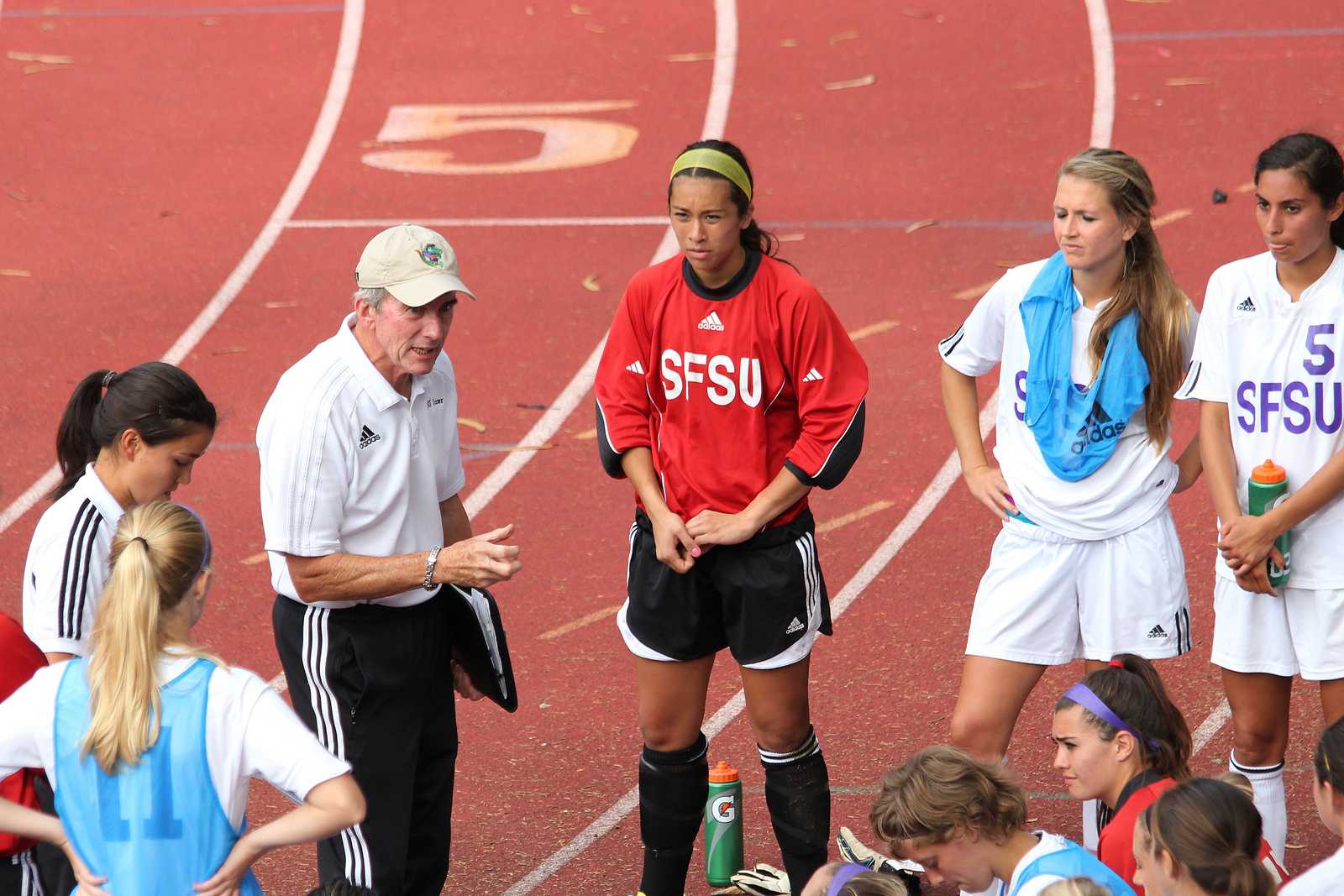 Head Women's Soccer Coach Jack Hyde talks with players during half-time at a game against Cal State Los Angeles at the SF State Cox Stadium on Sept. 20, 2013. Photo Ryan Leibrich / Xpress