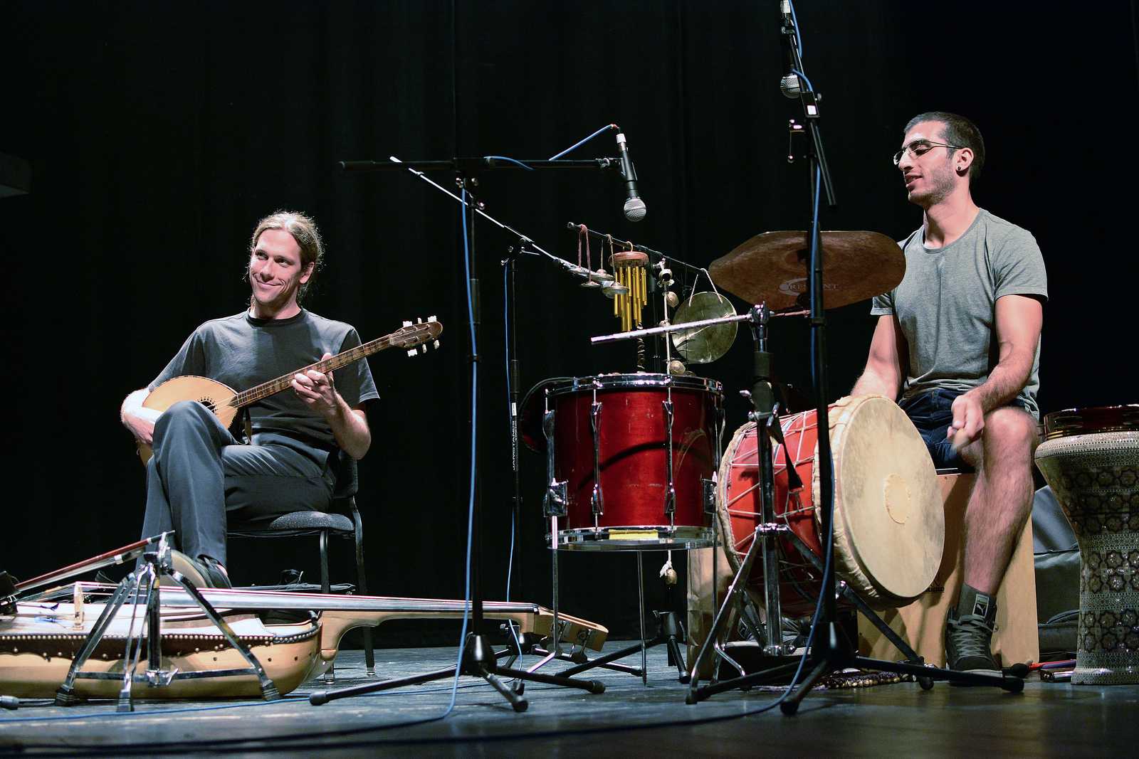 Miles Jay (left) plays the buzuq as Tareq Rantisi (right) beats a drum during an Arabic music seminar in McKenna Theater on Saturday, Sept. 28, 2013. The seminar was part of Room for Hope, a festival celebrating Palestinian culture. Photo by Philip Houston / Xpress