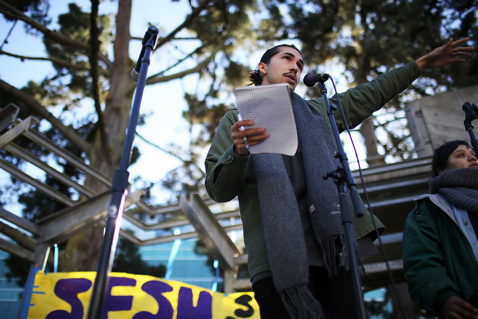 Michael Sanchez speaks to students about Tasers in Malcolm X Plaza during a rally Dec. 5. The rally was organized by a group of student organizations. Photo by John Ornelas / Xpress.