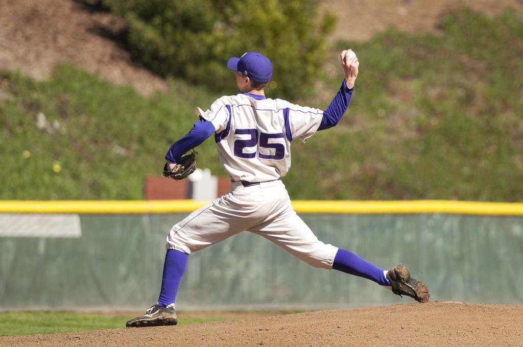 SF State's Preston Tater pitches the ball during the home game against CSU Monterey Bay at Mahoney Field Friday, March 7. Photo by Jessica Christian / Xpress