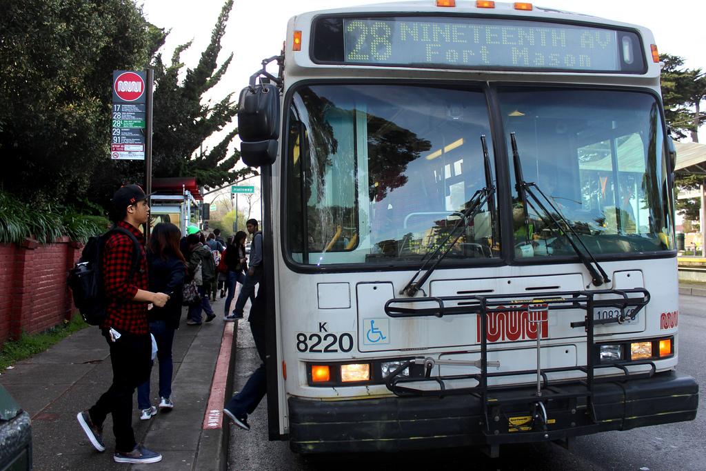 Sophomore Kinesology major Rodney Torres boards a 28 bus at the bus stop at the top of campus on 19th Avenue heading toward Fort Mason Monday, March 10. Photo by Tony Santos / Xpress 