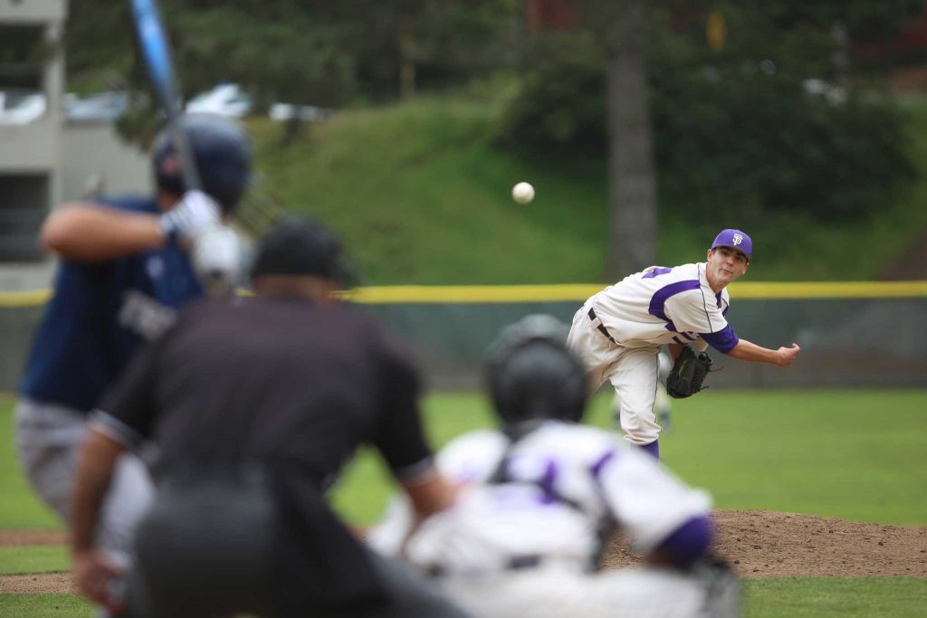 SF States Jack Veronin pitches  at the first game of a doubleheader against SF State at SF State Maloney Field Friday, April 18. SF State lost the first game 17-3 but rebounded in the second and won 3-1. Photo by Rachel Aston / Xpress