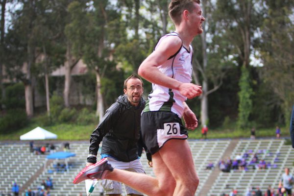 Ben Branagh (26) runs in the second heat of the mens 5000 meter race at the SF State Distance Carnival at Cox Stadium Friday April 4. Photo by Erica Marquez/Special to Xpress.