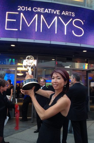 SF State alumna Chikako Suzuki poses with her award in front of Nokia Theater in Los Angeles at the 2014 Creative Arts Emmys, Aug. 16. Holiday Landa / Special to Xpress.