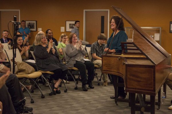 SF State music professor Victoria Neve stands to take a bow after playing a musical sonata from the de Bellis Collection on the Clementi fortepiano in the J. Paul Leonard Library Friday, Sept. 26, 2014. Frank Ladra / Xpress.