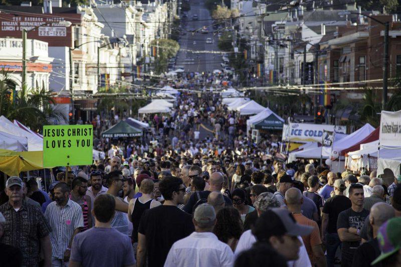 Fair attendees walk up and down the street while vendors sell merchandise at the Castro Street Fair in San Francisco Sunday, Oct. 5, 2014. Frank Ladra / Xpress.