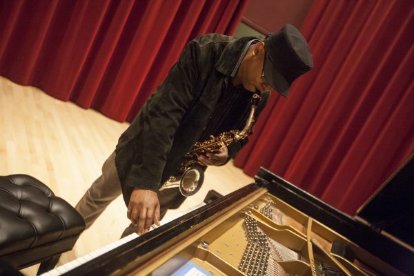 Renowned jazz saxophonist, Greg Osby, tunes his instrument before conducting a jazz master class in Knuth Hall Wednesday, Oct. 15, 2014. Martin Bustamante / Xpress.
