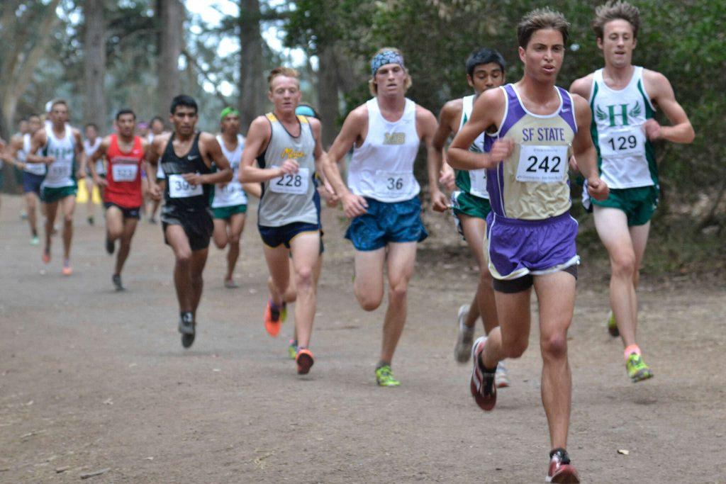 Michael Garaventa leads a pack during the cross country invitational at Speedway Meadow in Golden Gate Park Friday, Oct. 10, 2014.