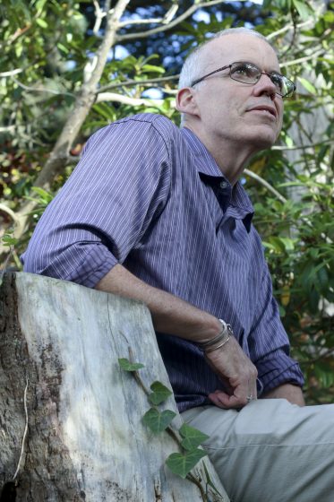 Bill McKibben, author and environmentalist, poses for a photo after his lecture on "Updates From the Front Lines of the Climate Fight" at McKenna Theatre at 2 p.m. Thursday, Oct. 16, 2014. Amanda Peterson / Xpress.