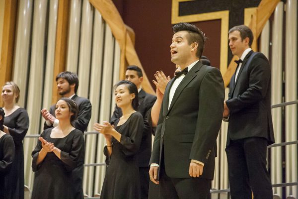 Jonathan White solos in the University Chorus's performance at the 13th annual Harvest Concert in Lakeside Presbyterian Church Friday, Nov. 14, 2014. Martin Bustamante/Xpress.