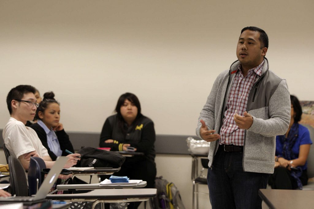 Eric Pido, Ph. D. assistant professor in the Asian-American studies department, shares experiences he has been through during the Violence Teach-In hosted at SF State Tuesday, Nov. 4, 2014.