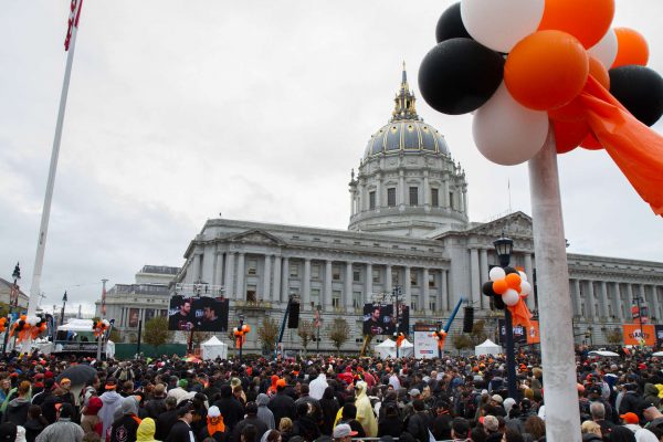 San Francisco Giants fans celebrate their 2014 World Series victory in the Civic Center Plaza outside of city hall Friday, Oct. 31, 2014. Eric Gorman/Xpress.