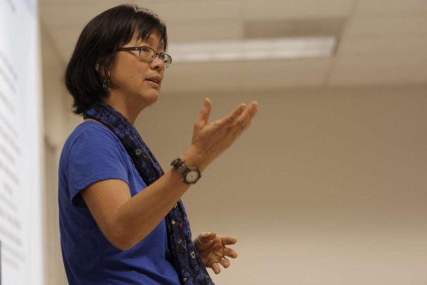 Grace J. Yoo, a professor in the Asian-American studies department, introduces the first speaker during the Violence Teach-In at SF State Tuesday, Nov. 4, 2014. Daniel Porter/Xpress.