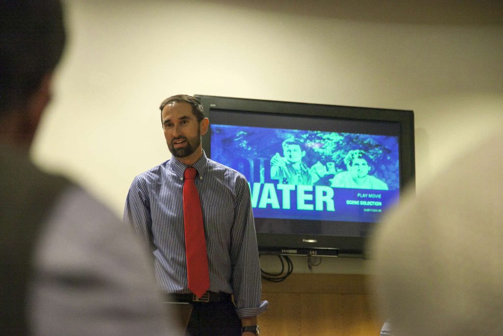 Assistant professor Jackson Wilson of the recreation, parks, and tourism department speaks to a crowd of students who came to see the documentary Oil & Water at the Richard Oakes Multicultural Center Wednesday, Nov. 5, 2014. Martin Bustamante/Xpress.