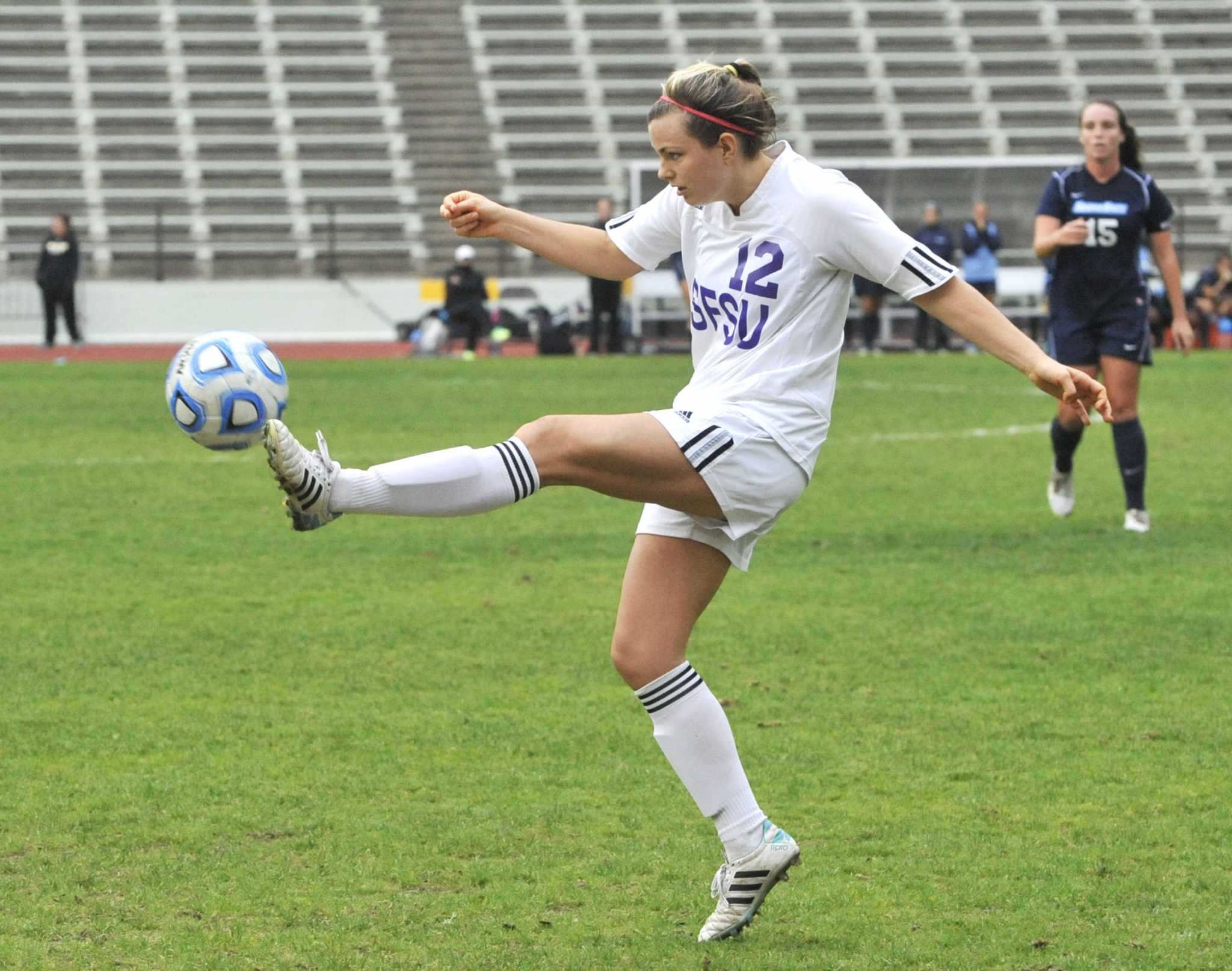 SF State Gators player Graceann Rettig, #12, volleys the ball during a game agianst the Sonoma State Seawolves at Cox Stadium Thursday, Oct. 30, 2014. Sara Gobets/Xpress.