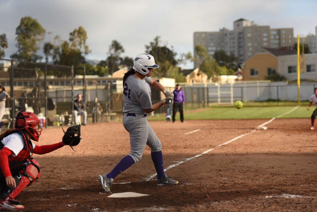 Freshman Sara Higa singles in game two of a doubleheader against The University of Hawaii at Hilo at SFSU Softball Stadium on Wednesday, Feb. 18, 2015. (David Henry / Xpress)