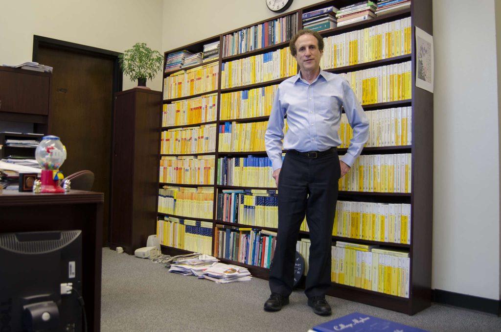 The current dean of the College of Science and Engineering Sheldon Axler stands in the office which will be taken over by his successor in the summer at his office in Robert A. Thornton Hall at SF State Monday, March 16. (Hyunha Kim / Xpress)
