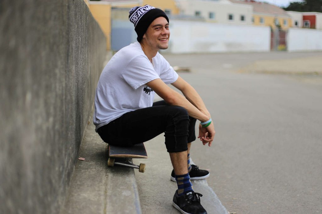 Sam Gershwin, a SF State cinema major and the owner of skate company Freakwency, stops for a portrait at the lowledge; a popular skate spot across from the West Campus Green on Monday, March. 16, 2015. (Kate Fraser / Xpress)