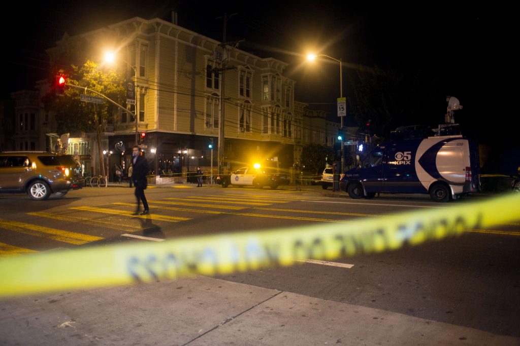 Police respond to a bomb threat on Bartlett Street between 22nd and 23rd streets in the Mission District on Friday February 27, 2015. People were told to remain situated and residents in the surrounding area evacuated their homes. Police cleared the scene at about 10:45pm. (Emma Chiang / Xpress)