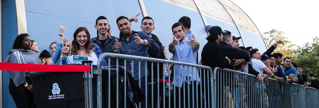 A group of SF State students pose for the camera at the front of the line for the G-EAZY concert at the Annex the evening of Fri. April 10. The show was the last hit of a weeklong celebration for SF States annual Rhythms Music Festival. (Kate Fraser / Xpress)