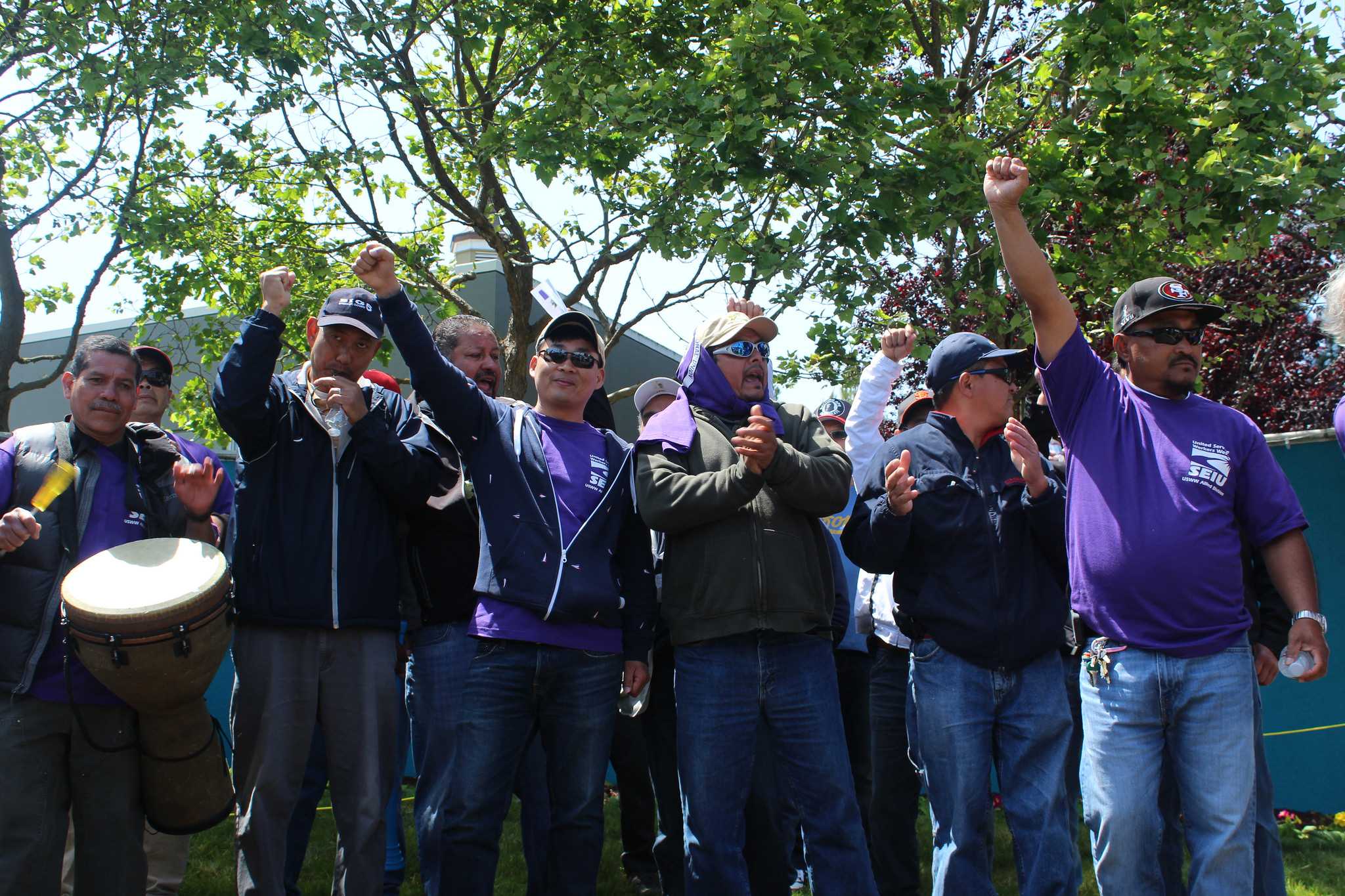Former Park Merced janitors and handymen who have been terminated two weeks prior rally in front of the Park Merced leasing office Thursday, April 23. (Angeline Ubaldo / Xpress)