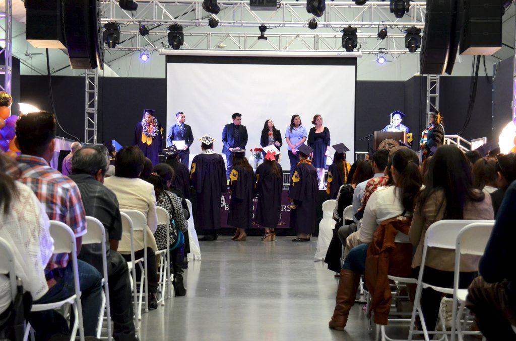 Undocumented graduating seniors line up in anticipation to receive their diplomas at the first annual Beyond Borders graduation in Annex 1 Sunday, May 17. (Tate Drucker / XPRESS).