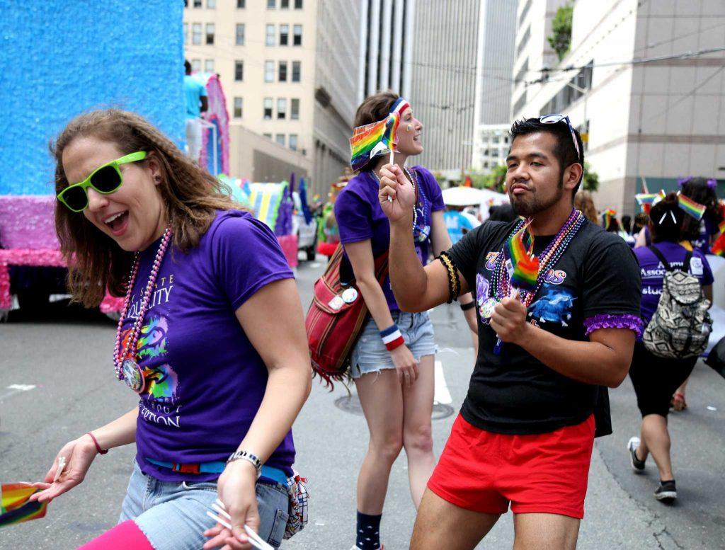 SF State students dance while waiting to participate in the Pride Parade in the Civic Center San Francisco on Sunday, June 28, 2015 (Xpress/Emma Chiang)
