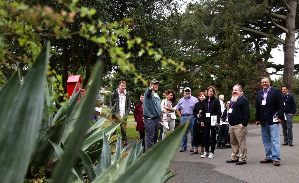 SF State gardener, Hugh Ennis, gives a landscape tour to a group of 15 attendees at the California Higher Education Sustainability Conference Wednesday July 22, 2015. (Xpress / Emma Chiang)