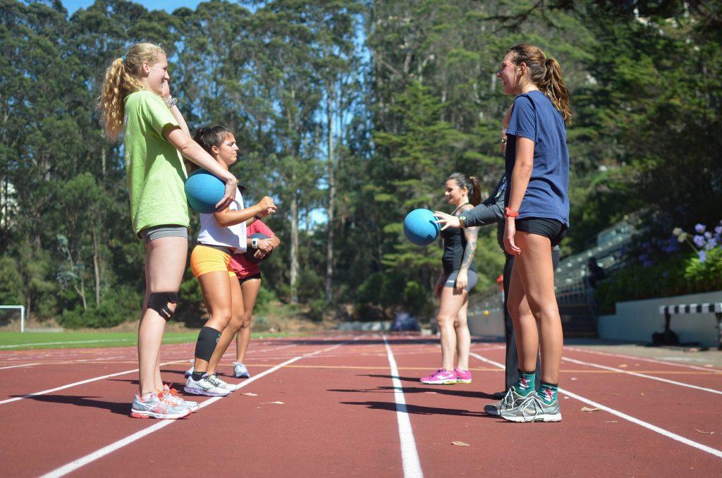 Members+of+the+SF+State+womens+cross+country+team+throw++medicine+balls+to+each+other+during+practice+at+Cox+Stadium+Monday%2C+August+24.+%28Melissa+Minton+%2F+Xpress%29