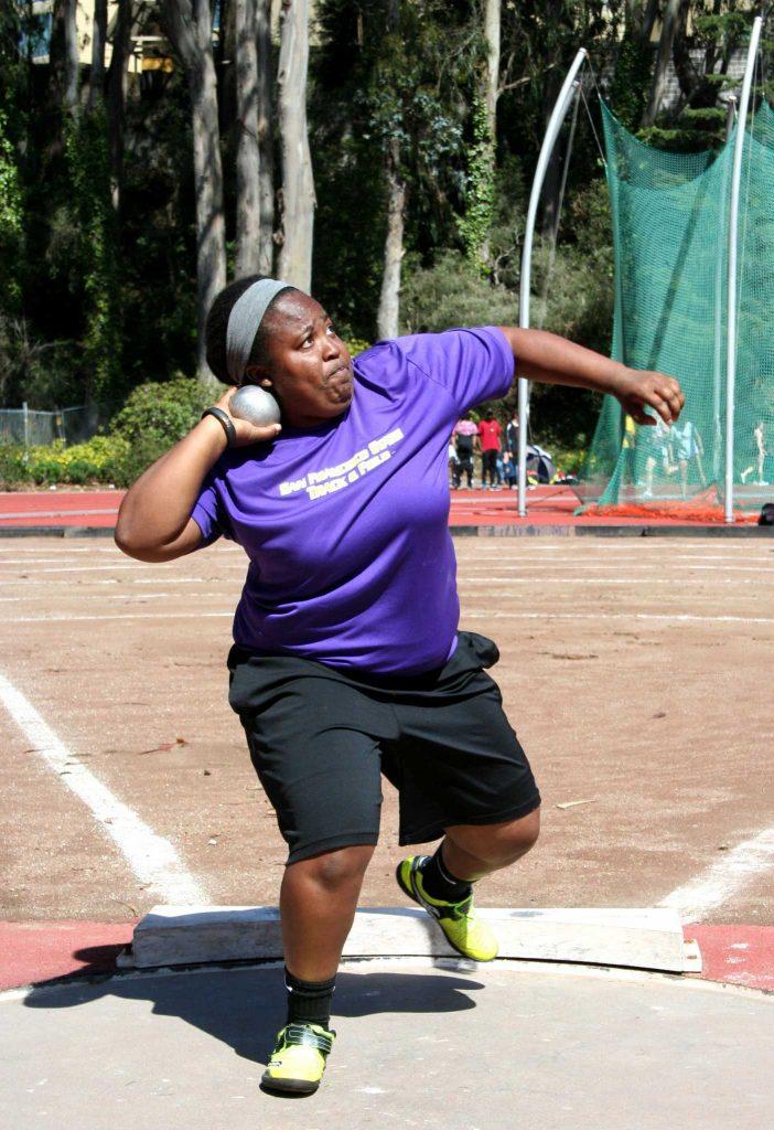 Ariana Luster, an SF State student and track and field athlete, died Wednesday, Oct. 21 after battling cancer. She was a member of the Gators track and field team in 2013-2014. Luster prepares to throw a weight during a regular tack and field practice at the SF State track on Cox Stadium February 10, 2014.  (Photo Courtesy of SF State Athletic Department)