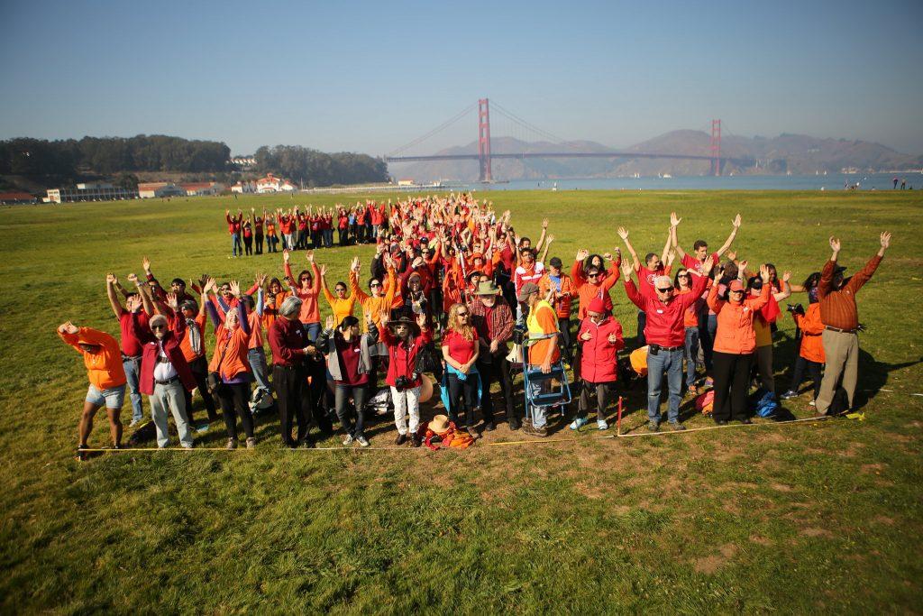 Participants form the figure 1 to celebrate the 100th anniversary of the National Park Service at Crissy Field in San Francisco November 14, 2015. (Joel Angel Juárez / Xpress)