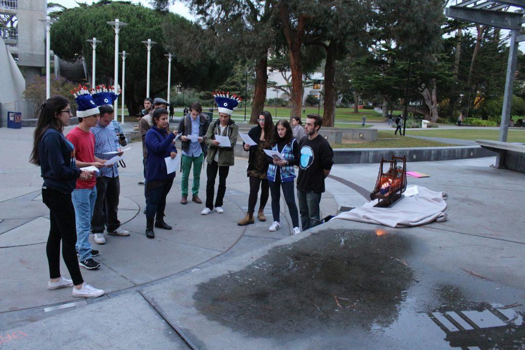 SF Hillel celebrates the second day of Hanukkah in Malcolm X Plaza Tuesday, Dec 8. (James Chan/Xpress)