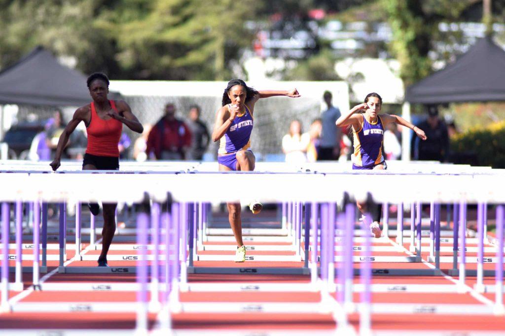 Devanique Brown, hurdler for the SF State Gators womens track and field team came in a close second place in the 100 meter hurdles event on Saturday, Feb. 27, 2016 at Cox Stadium. (Eric Chan / Xpress)