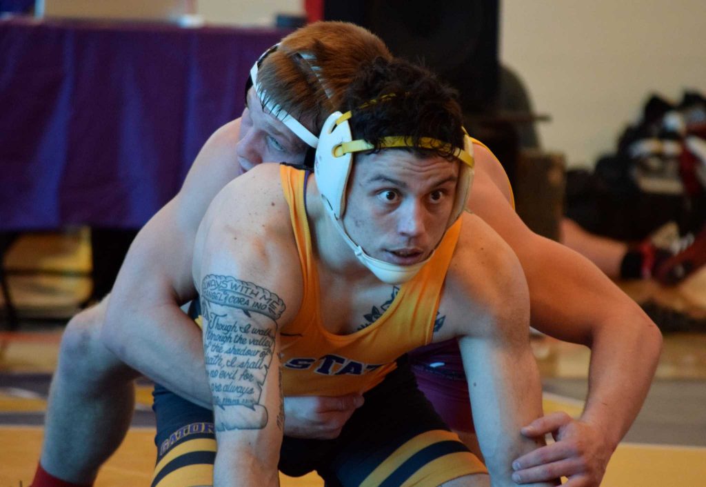 SF State Gators wrestler Tavis Ino gets mentally prepared during the second match of a dual meet against the Colorado Mesa University Mavericks on Saturday, February 6, 2016. (Eric Chan / Xpress)