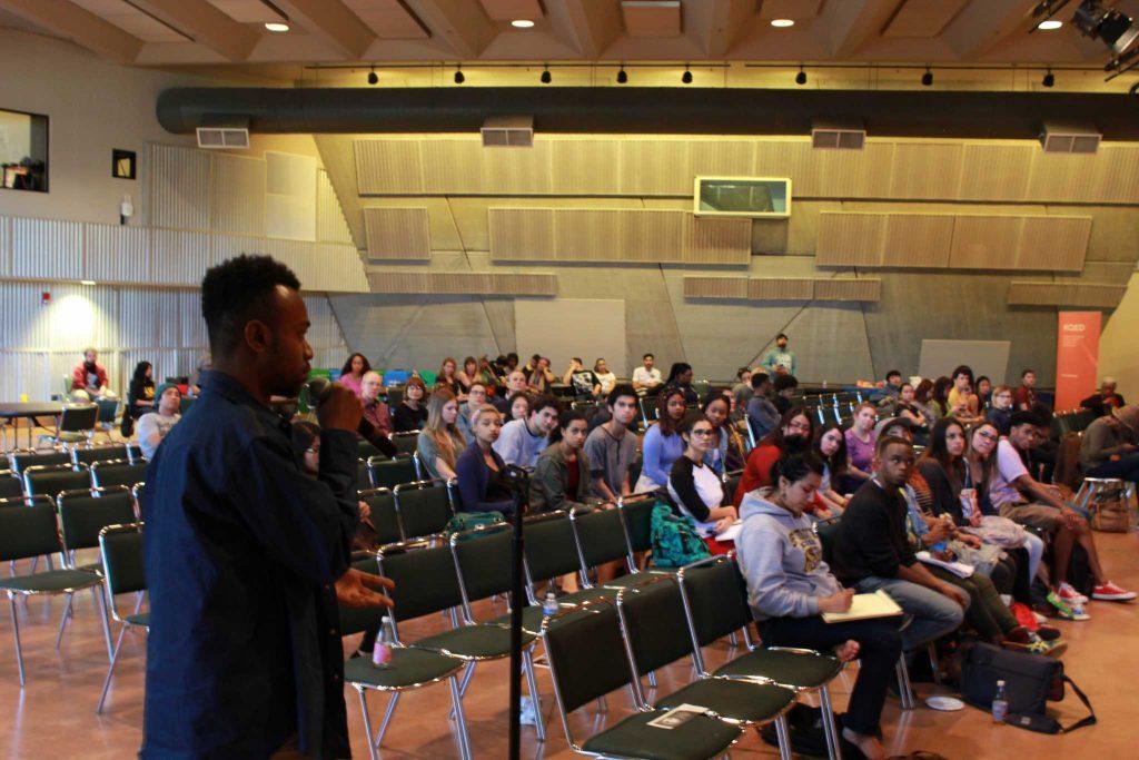 Mike Evans Jr (left), SF State student activist addresses the audience on how to educate the public and get involved within the community to make a difference at the Jack Adams Hall at SF State, Monday, Feb. 8, 2016. (Xpress / Ryan Zaragoza)
