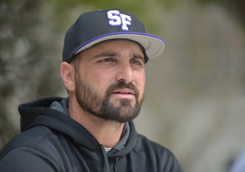 SF State assistant baseball coach Tyler LaTorre talks to Golden Gate Xpress reporter during an interview on SF State campus Thursday, Feb.11. (Qing Huang / Xpress) 
