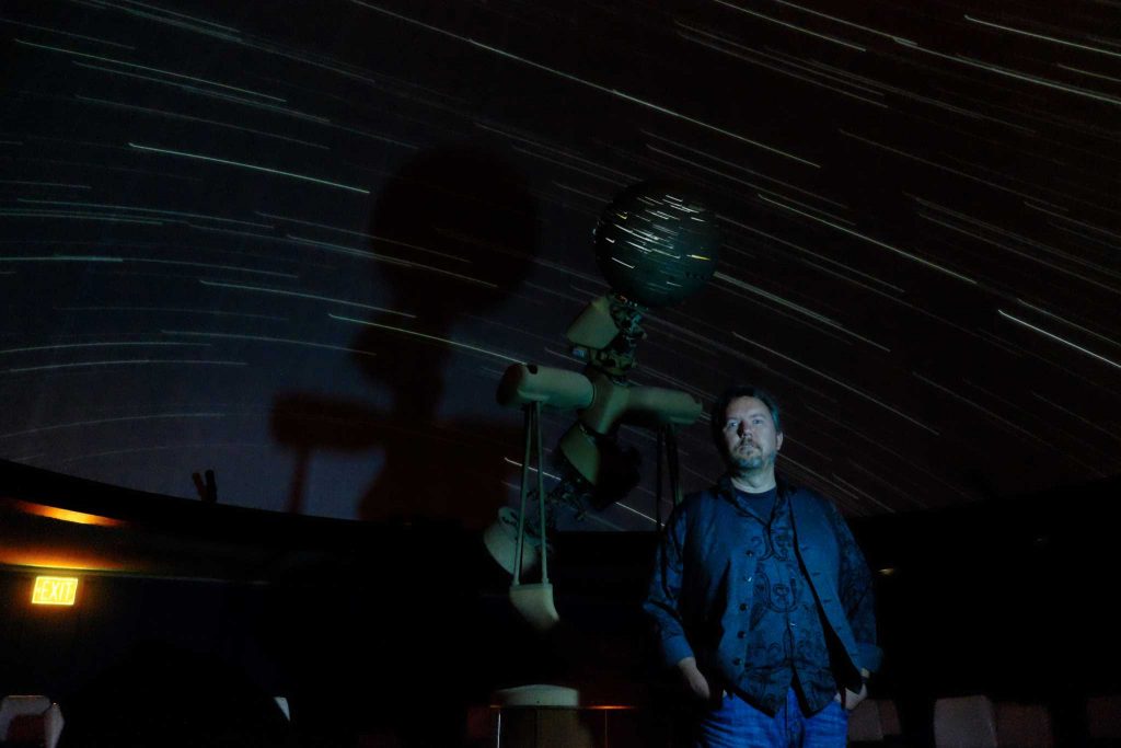 Stephen Kane, a professor of physics and astronomy at SF State, in the campus planetarium, Friday, April 8, 2016.  Kanes mapping of planet 55 Cancri revealed similarities with Earth. (Taylor Reyes / Xpress)