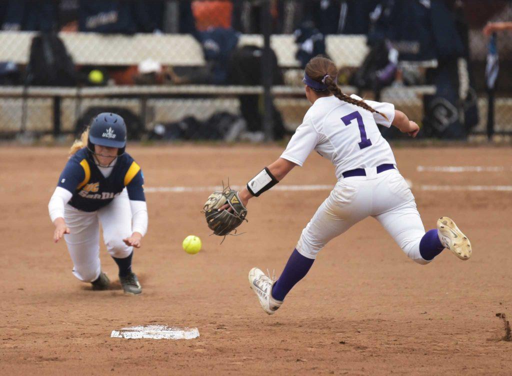 UC San Diego Tritons second base Darian Van Der Maaten (13) slides into second base against SF State Gators infielder Jennifer Lewis (7) during the first game of a doubleheader at the SFSU softball field Friday, Apr.8. Gator won 2-0. (Qing Huang / Xpress)