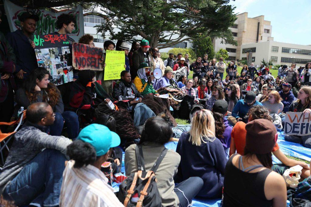 Students and faculty gather in the quad for a press conference regarding demands for SF State, President Wong on the eighth day of the  hunger strike on Monday.  The hungerstrike is led by the Third World Liberation Front 2016, a name used to pay homeage to the 1968 strike.  (Aleah Fajardo/ Xpress)
