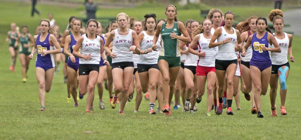 SF State Gators junior Magali Arsiniega (second right) leads the race during the first loop of the 5800 meter race at Hellman Hallow Meadow in Golden Gate Park on Thursday, Sept. 15, 2016. Arsiniega finished the race in 14 place with a time of 23:00.00.