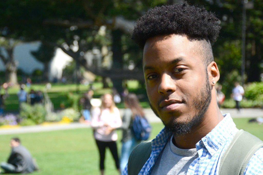 Timothy Walker, the only student on the Racial and Identity Profiling Advisory Board, poses for a portrait in the quad at SF State on Tuesday, September 6, 2016.