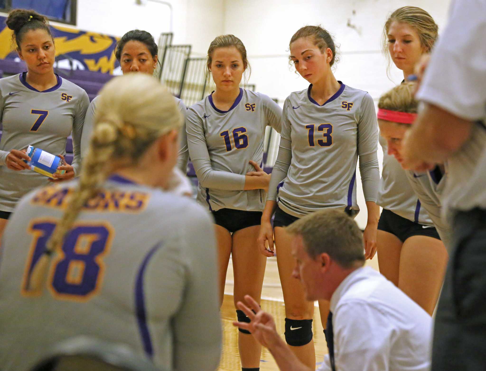 SF State Gators’ head coach Matt Hoffman talks with his team during their loss against Sonoma State University at the Swamp on Saturday, Sept. 17, 2016. The Gators fell to the Seawolves in three straight sets.