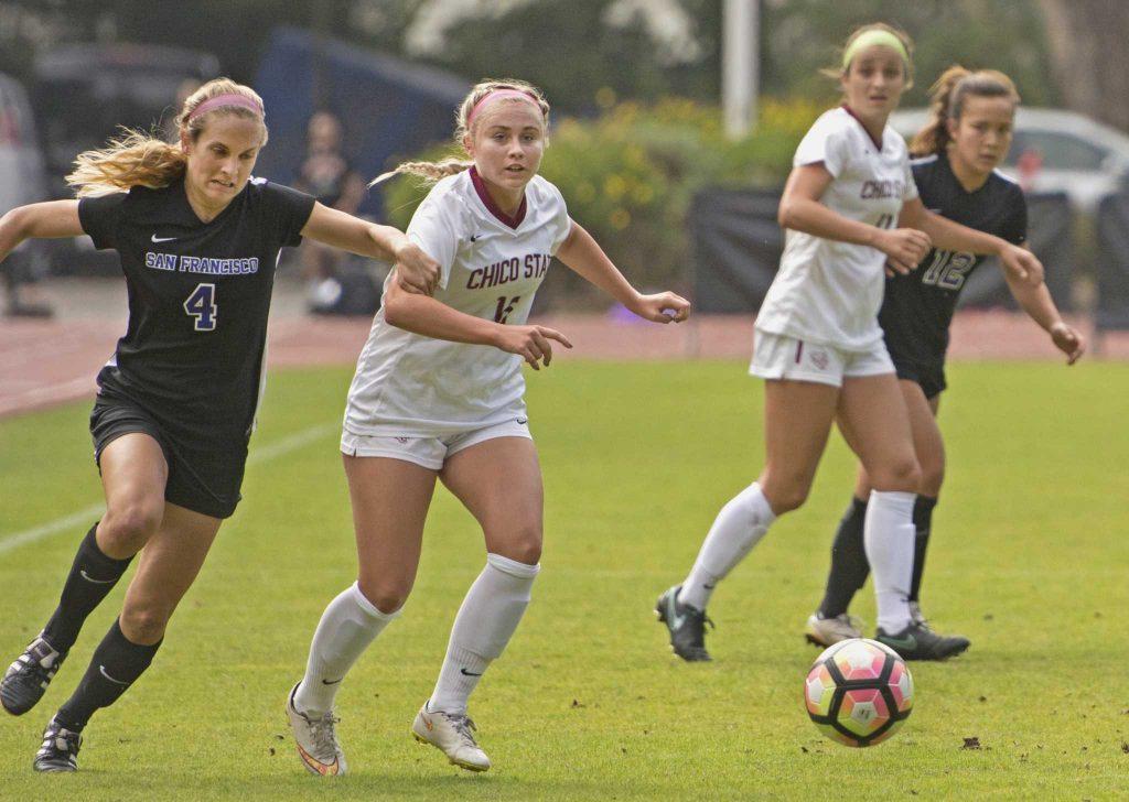 SF State Gators senior forward Autumn Fox (4) breaks through the Wildcats defense during their 2-1 win over Chico State University at Cox Stadium on Friday, Sept. 16, 2016.