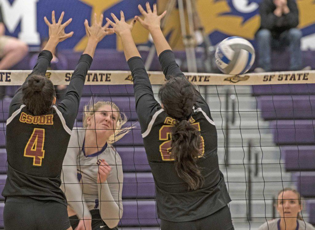 SF State Gators freshman middle blocker Abby Griffith spikes the ball during their loss against Cal State Dominguez Hills at the Swamp on Friday, Sept. 30, 2016. The Gators fell to the Toros in the fifth set.