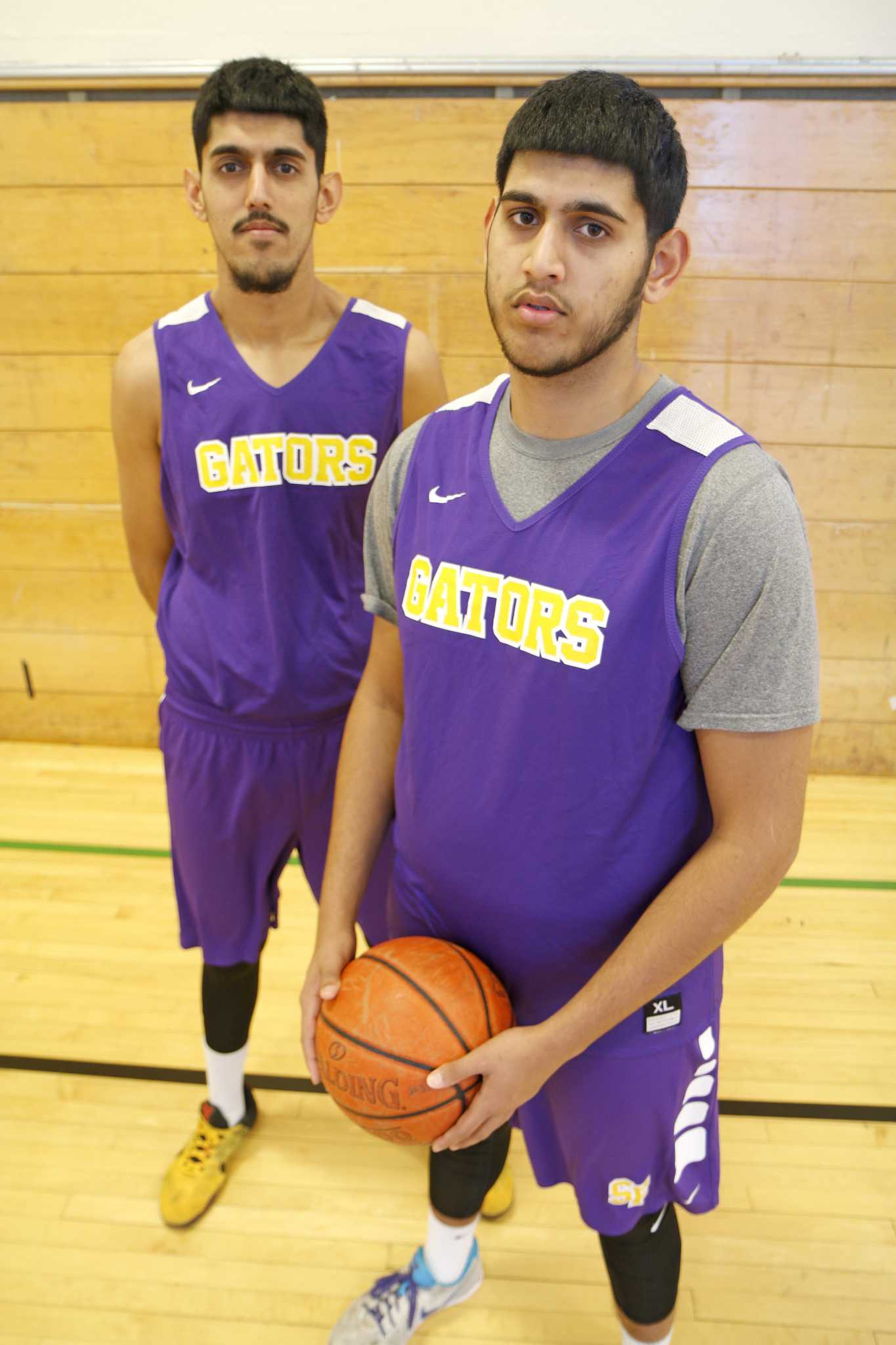 SF State Gator men’s basketball players AJ and Jash Kahlon pose for a portrait in the practice GYM on Tuesday, Nov. 29, 2016. This season will make the first time the Kahlon brothers have played together.