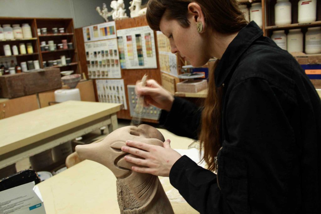 Kristin Hoots, 24, studio art major works on a piece for the annual ceramics sale on Dec. 1, 2016. Photo: Kayleen Fonte