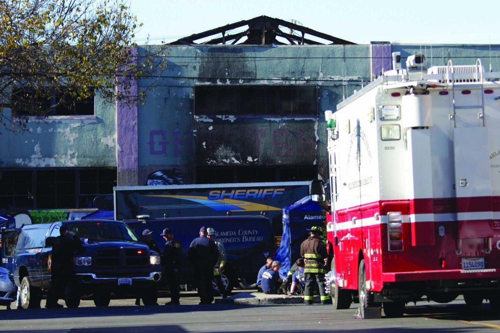 Alameda County Sheriffs, Oakland Fire Department, American Red Cross and Alameda County Coroners Bureau are at the scene of the Ghost Ship artist warehouse fire on Friday, in Oakland, Calif. on Saturday, Dec. 3, 2016. (Kona Kalamian / Special to Xpress)