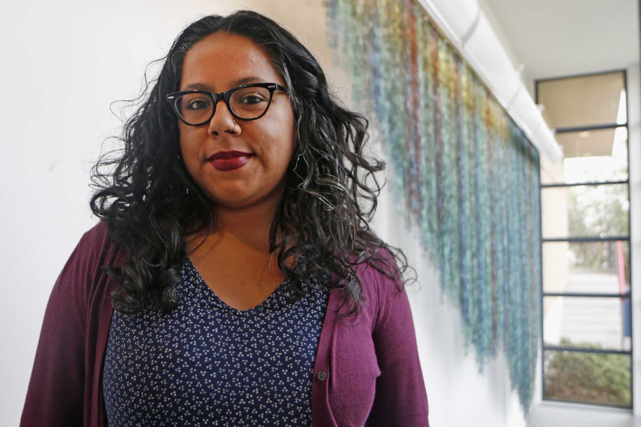 Candy Guinea a SF State graduate student poses for a portrait at SF State on

Tuesday, Dec. 6 2016. Guinea has received the 2016 Princess Grace Award for her films

that provide commentary on social justice. (Photo: Connor Hunt/Xpress)